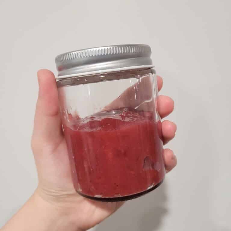 a jar of strawberry puree