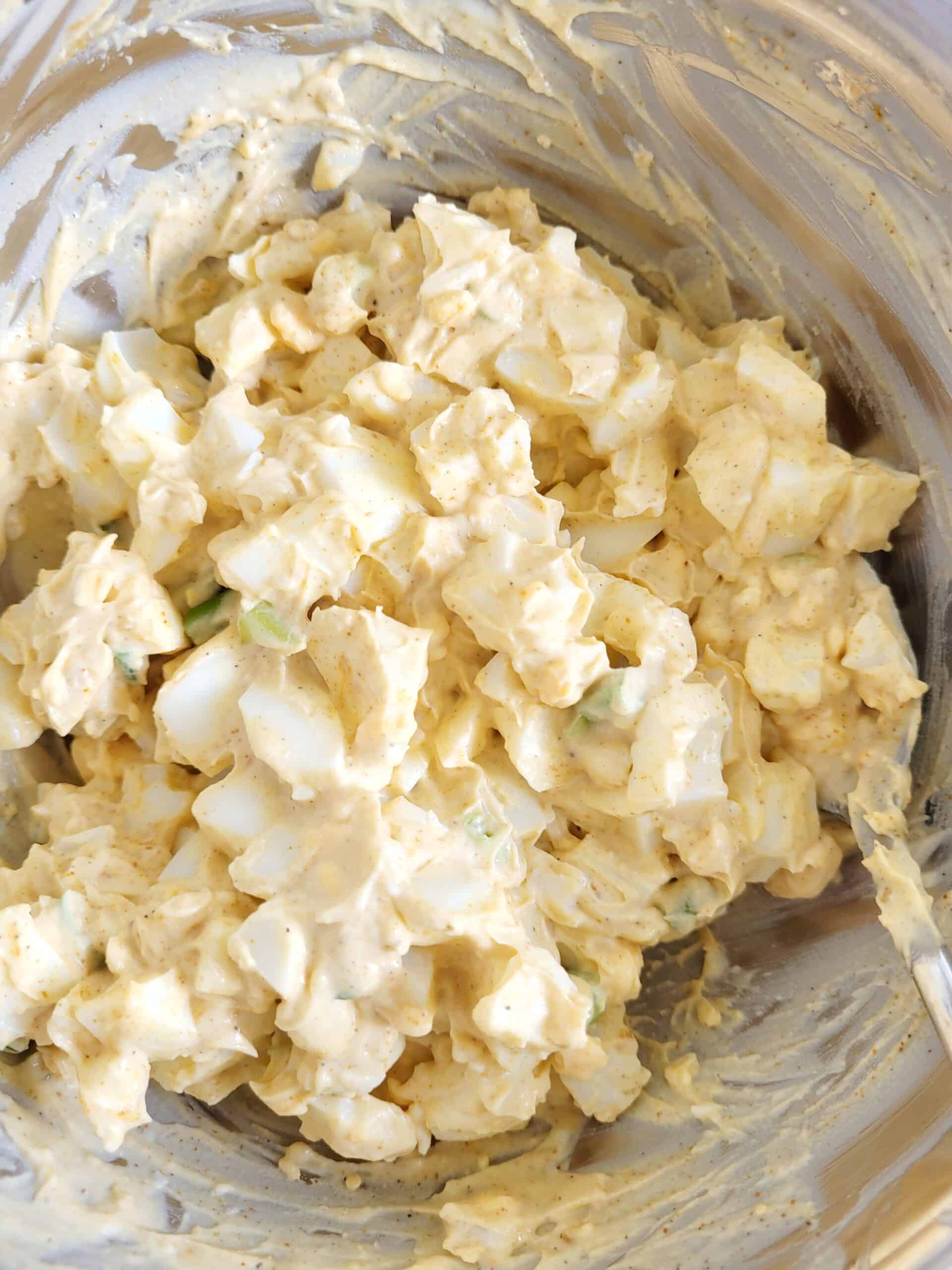 Easy curried egg salad in a bowl.